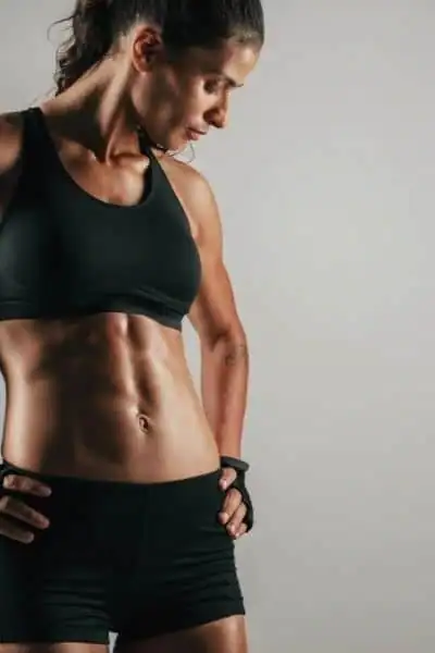 Toning Up at Home: The Ultimate Guide to Bodyweight Exercises 2 Image of woman's toned stomach after bodyweight exercises Bury St Edmunds and non-surgical treatment from Lipo 360