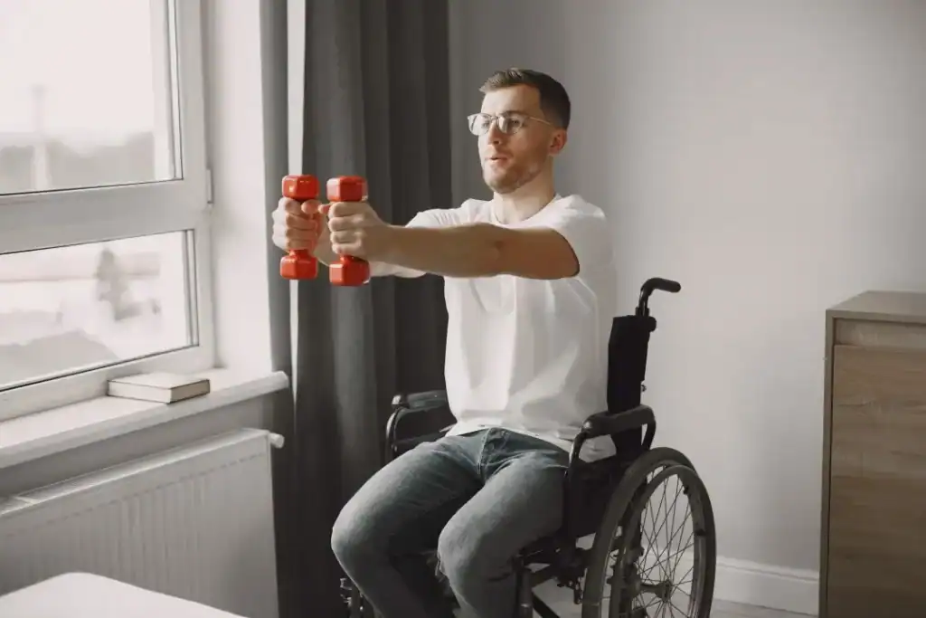 Image of man doing exercise in his wheelchair to aid weight loss Bury St Edmunds