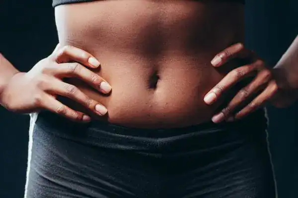 Toning Your Stomach: The Ultimate Guide to Achieving a Sculpted Stomach While Shedding Pounds 1 Image of a toned stomach after non surgical treatment Bury St Edmunds
